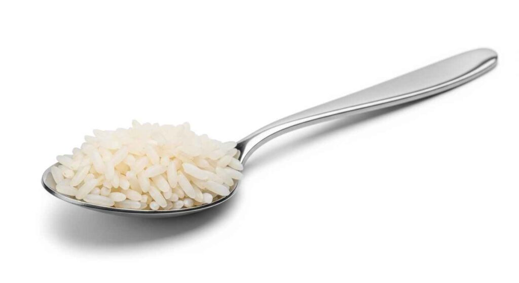 Teaspoon of plain cooked white rice.